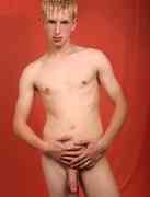 White-haired twink plays with cock at EastBoys